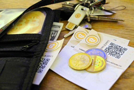 bitcoin-paper-coin-and-usb-wallets