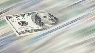 money-transfer-concept-100-us-dollar-banknote-with-blurred-motion-effect