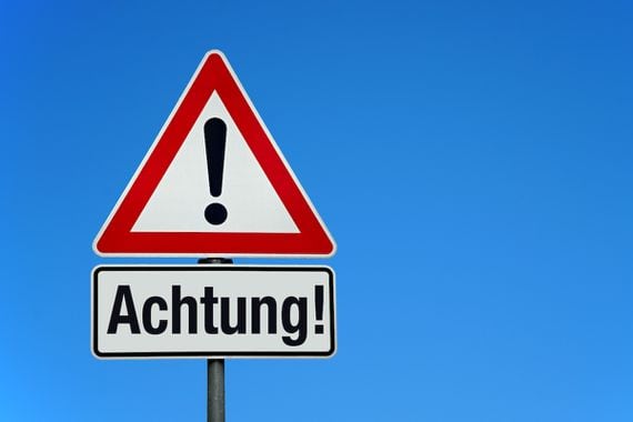 attention-and-warning-sign-with-german-text-achtung-translation-attention