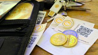 bitcoin-paper-coin-and-usb-wallets